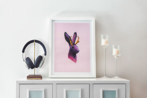 Jackalope on a sideboard with headphones